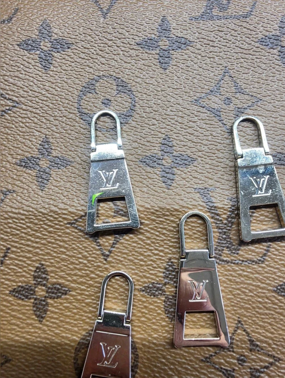 Louis Vuitton Gold-Tone LV Zipper Pull Charms (Set of 4)